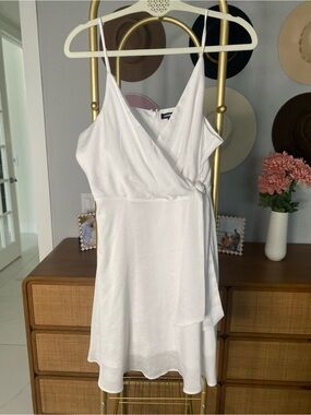 Express Sleeveless sheer wrap dress.